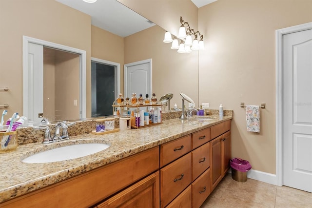 bathroom with tile patterned flooring and vanity