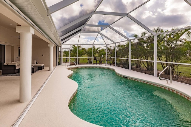 view of pool featuring an outdoor living space, a lanai, and a patio