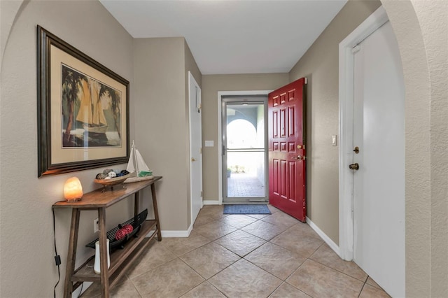 foyer with light tile patterned floors