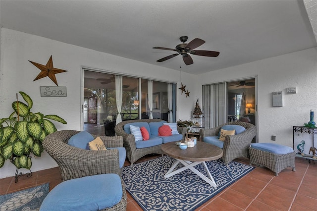 view of patio / terrace featuring an outdoor living space and ceiling fan