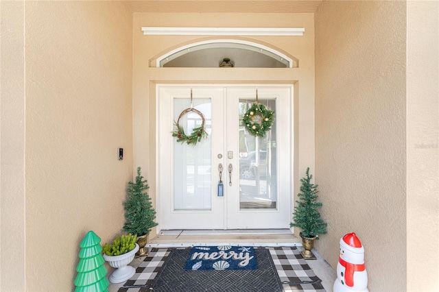 doorway to property with french doors