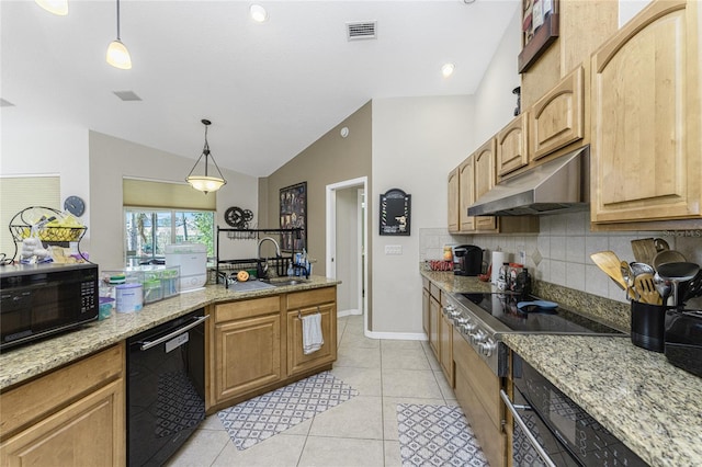 kitchen with light stone counters, light tile patterned floors, black appliances, and lofted ceiling