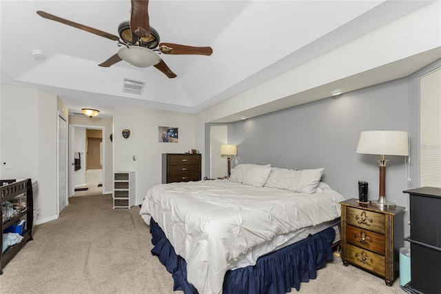 carpeted bedroom featuring ceiling fan