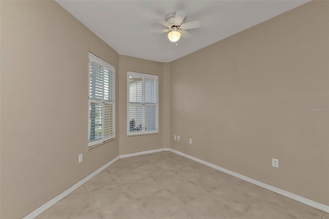 spare room featuring ceiling fan