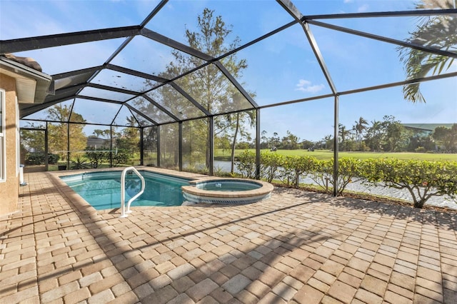 view of swimming pool featuring an in ground hot tub, a patio, a water view, and glass enclosure