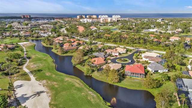 bird's eye view with a water view