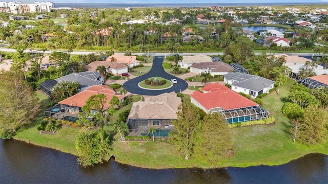 bird's eye view with a water view