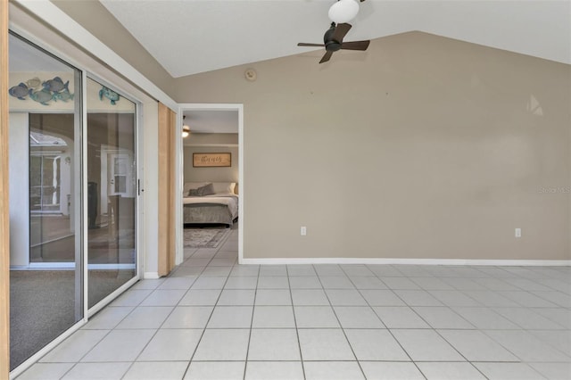 167 Mocha Ct, Punta Gorda, FL 33983 - spare room featuring lofted ceiling, ceiling fan, baseboards, light tile patterned floors, and a smoke detector