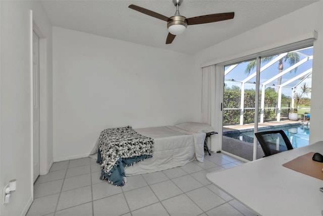 167 Mocha Ct, Punta Gorda, FL 33983 - bedroom with a sunroom, light tile patterned flooring, access to exterior, and ceiling fan