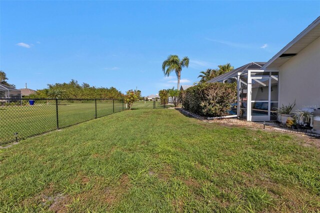 167 Mocha Ct, Punta Gorda, FL 33983 - view of yard featuring glass enclosure