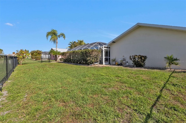 167 Mocha Ct, Punta Gorda, FL 33983 - view of yard featuring glass enclosure