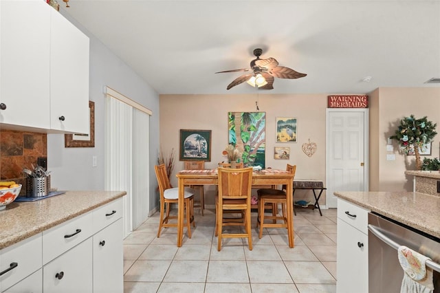 dining room with ceiling fan and light tile patterned floors