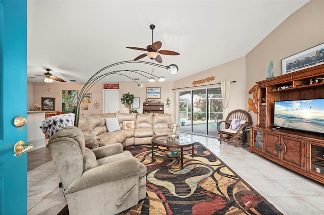 tiled living room featuring ceiling fan and lofted ceiling