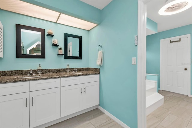 bathroom featuring vanity and tile patterned floors