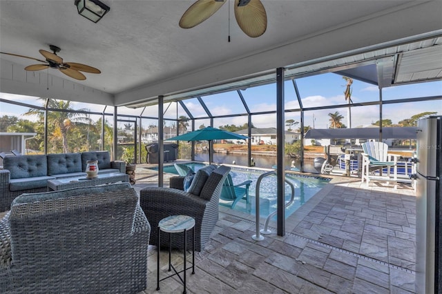 view of swimming pool featuring glass enclosure, an outdoor living space, a water view, and a patio