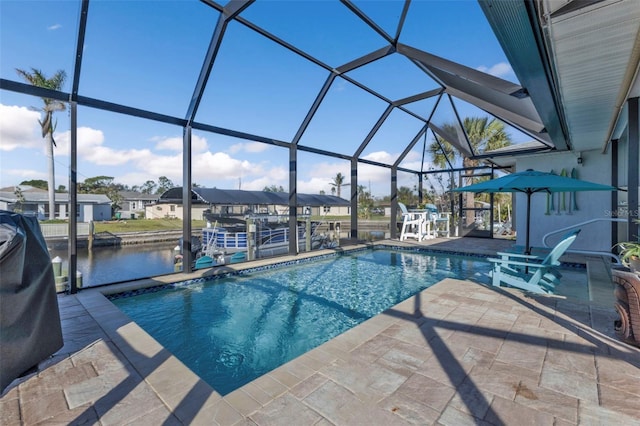 view of pool featuring a lanai, a dock, a water view, and a patio