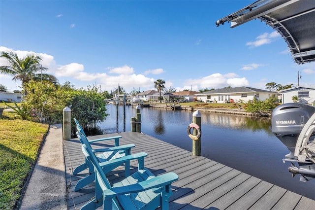 dock area with a water view