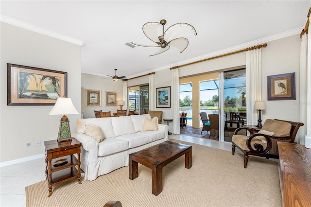 living room featuring ornamental molding and light tile patterned floors