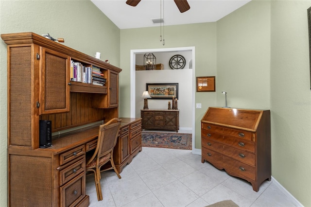 office with light tile patterned floors and ceiling fan