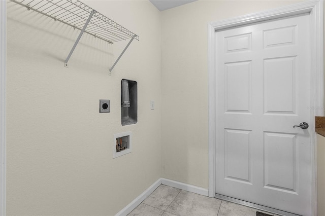 laundry area with hookup for a washing machine, light tile patterned floors, and electric dryer hookup