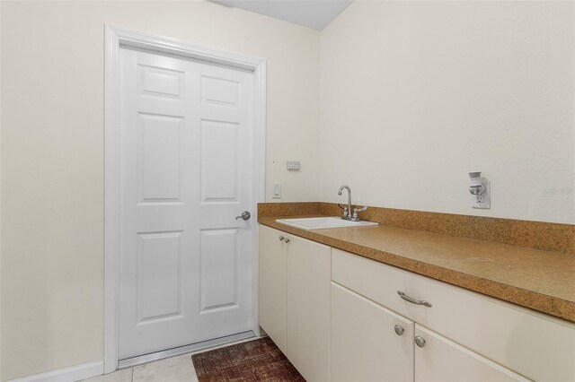 15460 Longview Rd, Port Charlotte, FL 33981 - bathroom with vanity and tile patterned floors