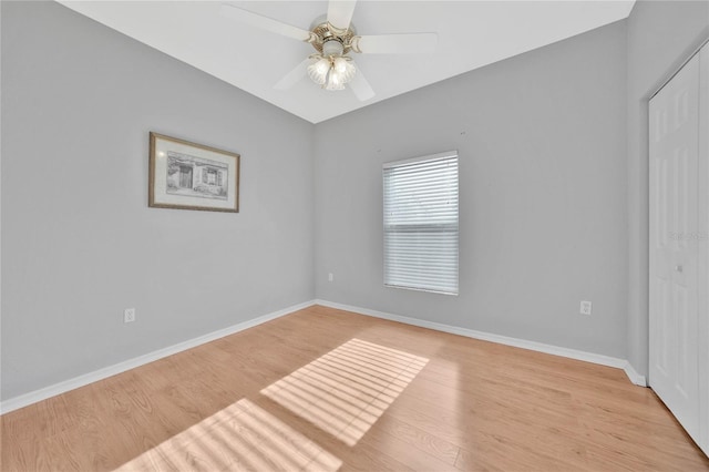 unfurnished room with ceiling fan and light hardwood / wood-style flooring