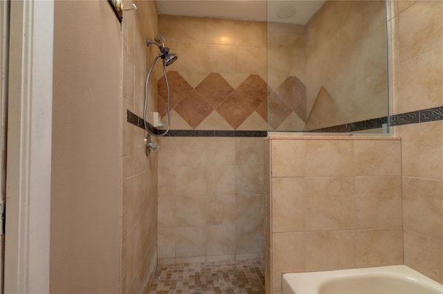 bathroom with separate shower and tub