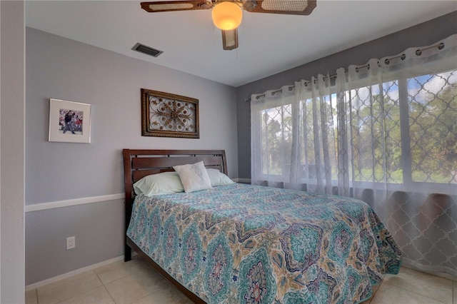 bedroom featuring ceiling fan and light tile patterned floors