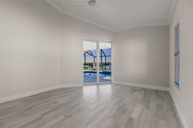 17183 Ohara Dr, Port Charlotte, FL 33948 - spare room with crown molding, ceiling fan, light wood finished floors, a sunroom, and baseboards