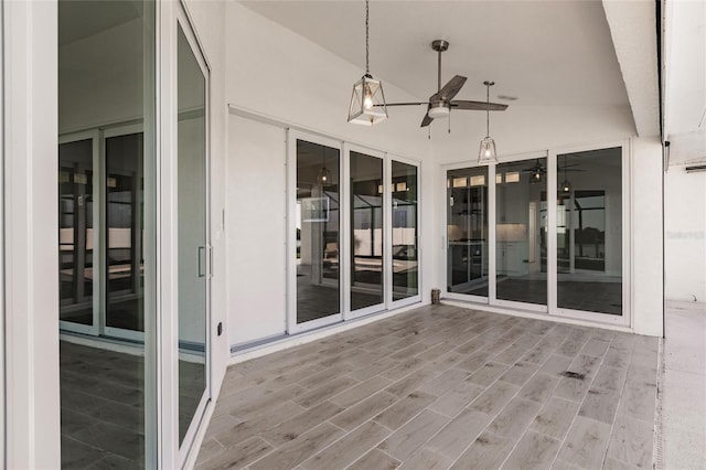 17183 Ohara Dr, Port Charlotte, FL 33948 - unfurnished sunroom with a ceiling fan and vaulted ceiling
