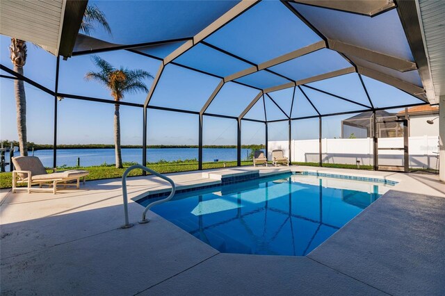 17183 Ohara Dr, Port Charlotte, FL 33948 - swimming pool featuring a water view, a patio, and glass enclosure
