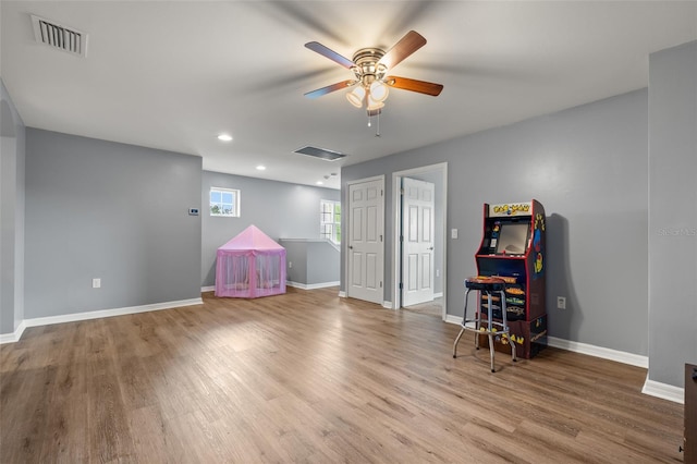 rec room featuring ceiling fan and wood-type flooring