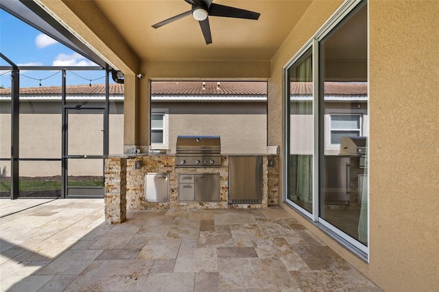 view of patio featuring area for grilling, a grill, a lanai, and ceiling fan