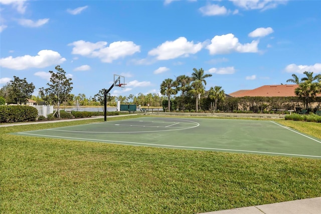 view of basketball court featuring a yard