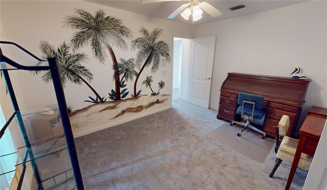 carpeted office with ceiling fan