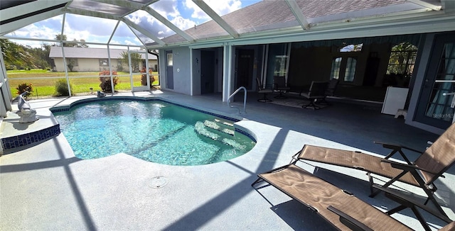 view of pool featuring a lanai and a patio area