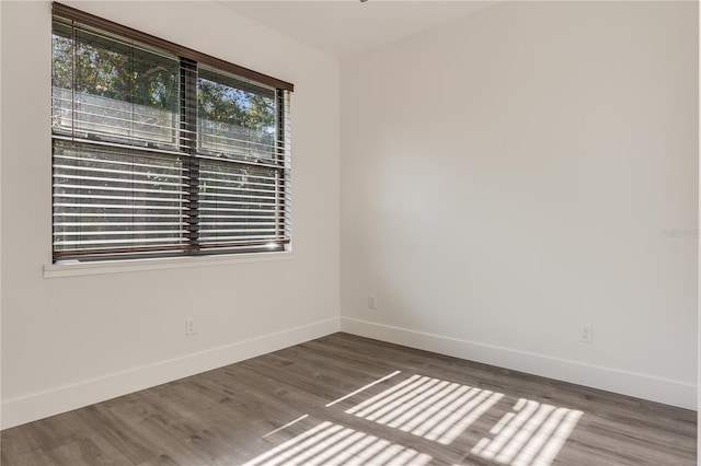 spare room featuring hardwood / wood-style flooring