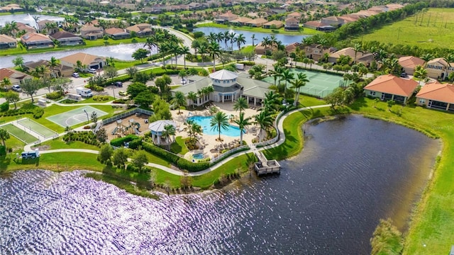 bird's eye view with a water view