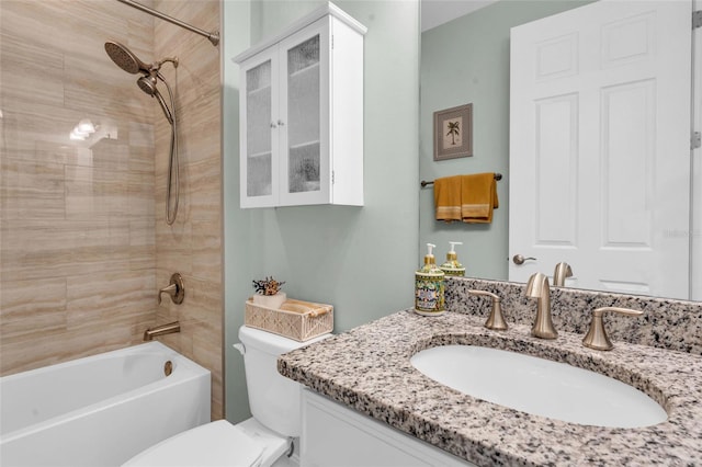 full bathroom featuring vanity, toilet, and bathing tub / shower combination