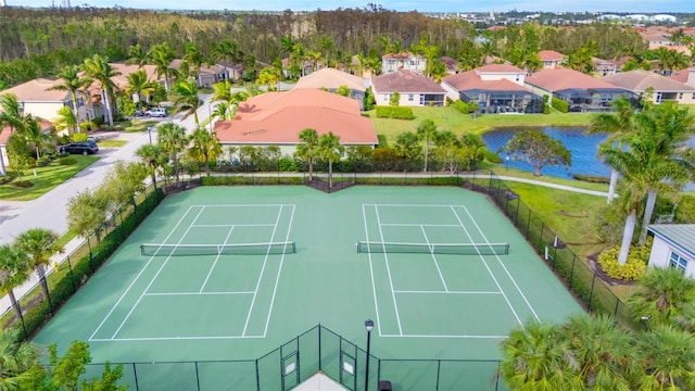 aerial view featuring a water view and a residential view