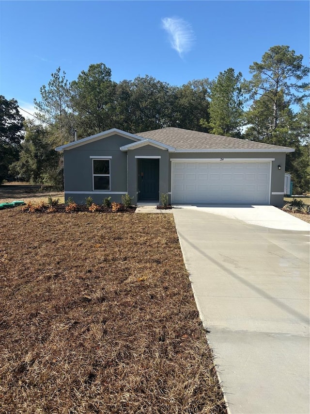 ranch-style home with a garage