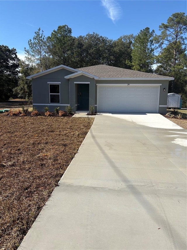 ranch-style home featuring a garage