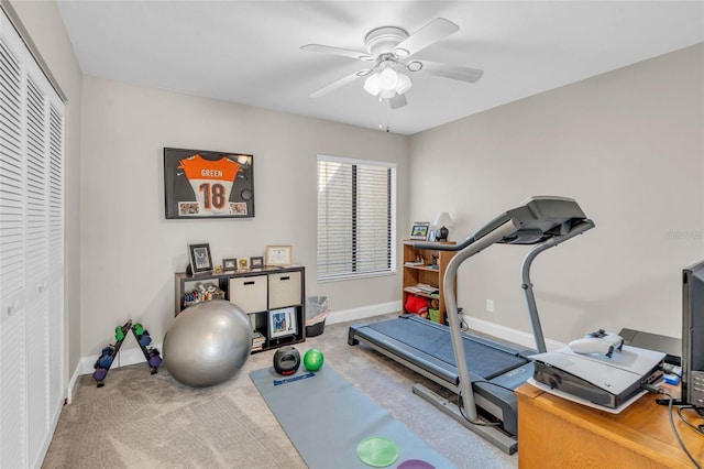 workout room featuring carpet flooring and ceiling fan