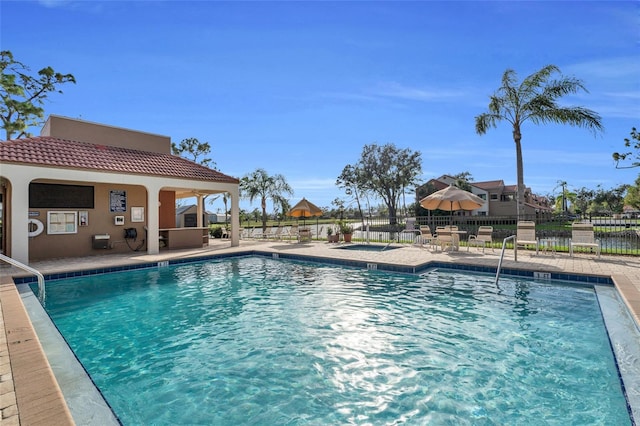 view of pool featuring a patio