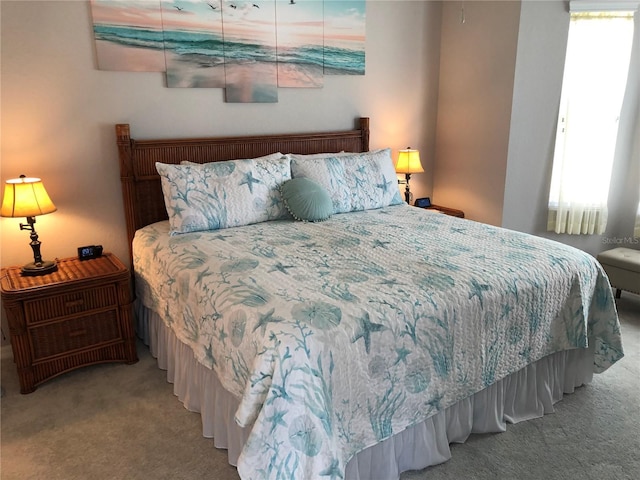 bedroom with light colored carpet