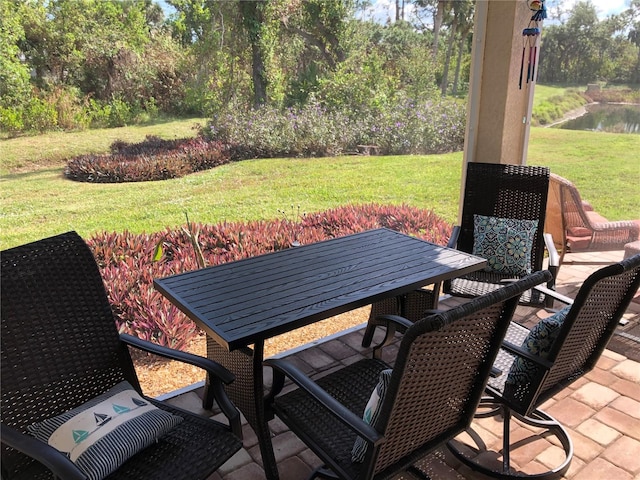 view of patio / terrace featuring a water view