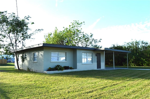 ranch-style home with a front yard