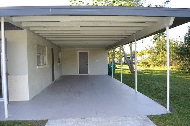 view of patio / terrace with a carport