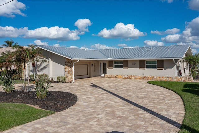 view of front of home with a garage