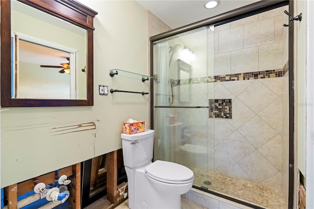 bathroom with toilet and walk in shower